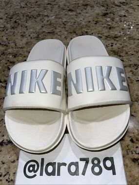 Nike White Slides with Silver NIKE Logo